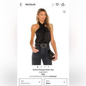 black halter top fits well. worn twice. no flaws or stains